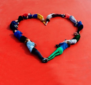 145565790-young-people-form-a-heart-gettyimages