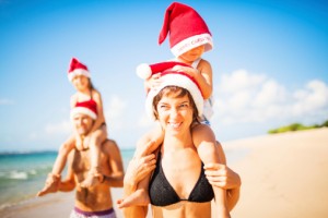 171581937-family-christmas-on-a-beach-gettyimages