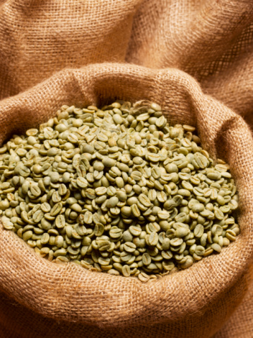 sb10064753e-001-green-coffee-beans-in-sack-close-up-gettyimages